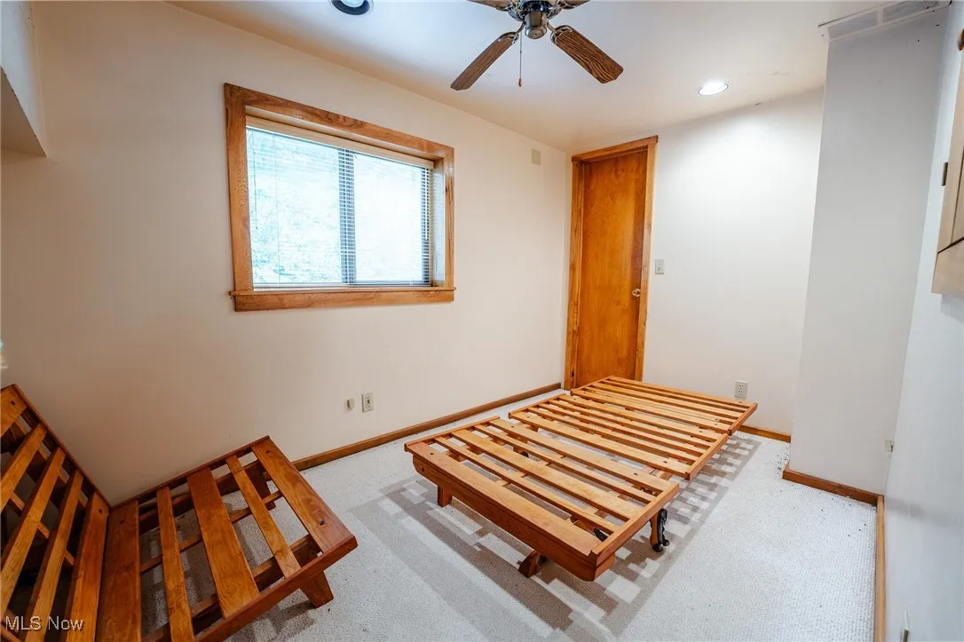 Bedroom with recessed lighting, a ceiling fan, and light carpet