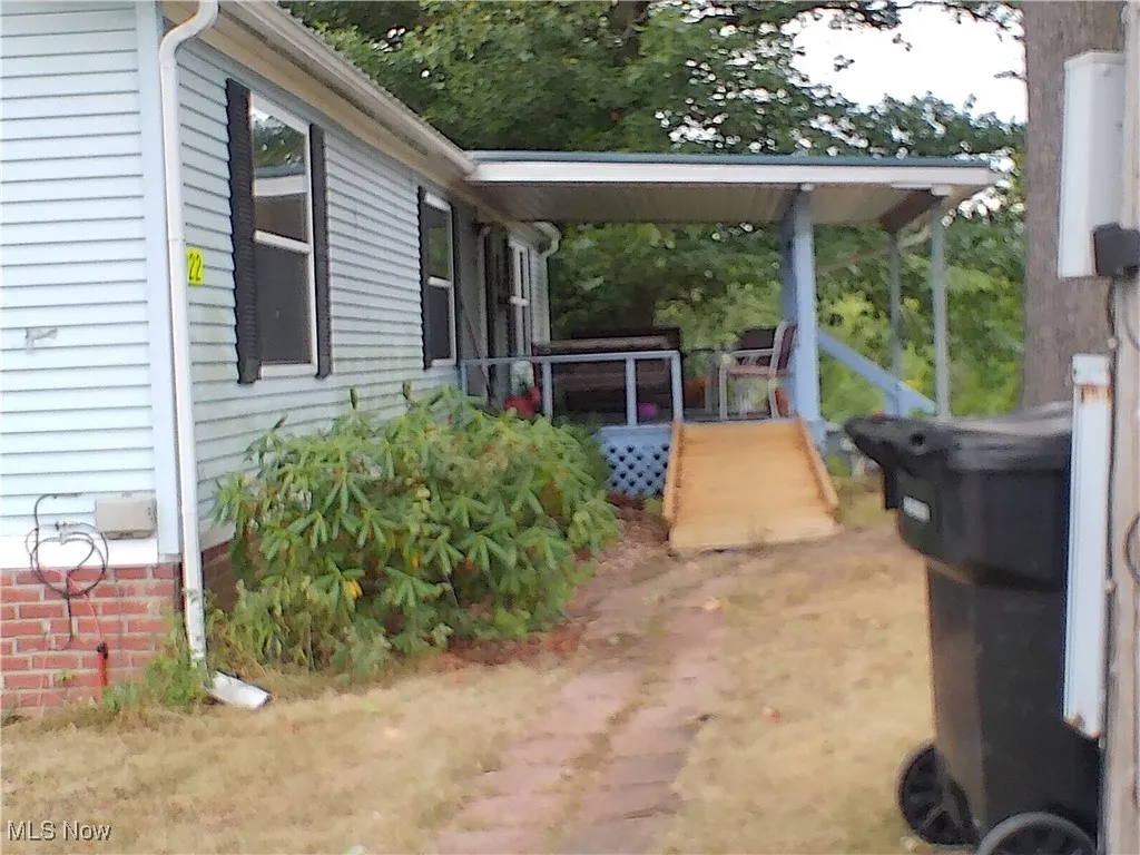 View of yard with a deck