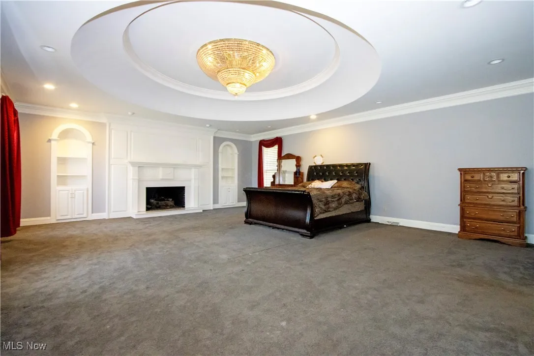 primary bedroom with fireplace