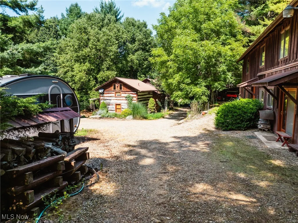 View of yard with driveway
