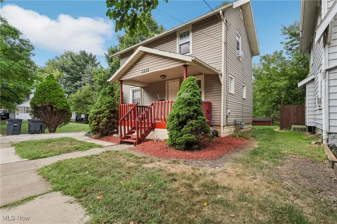 View of front of property with a porch
