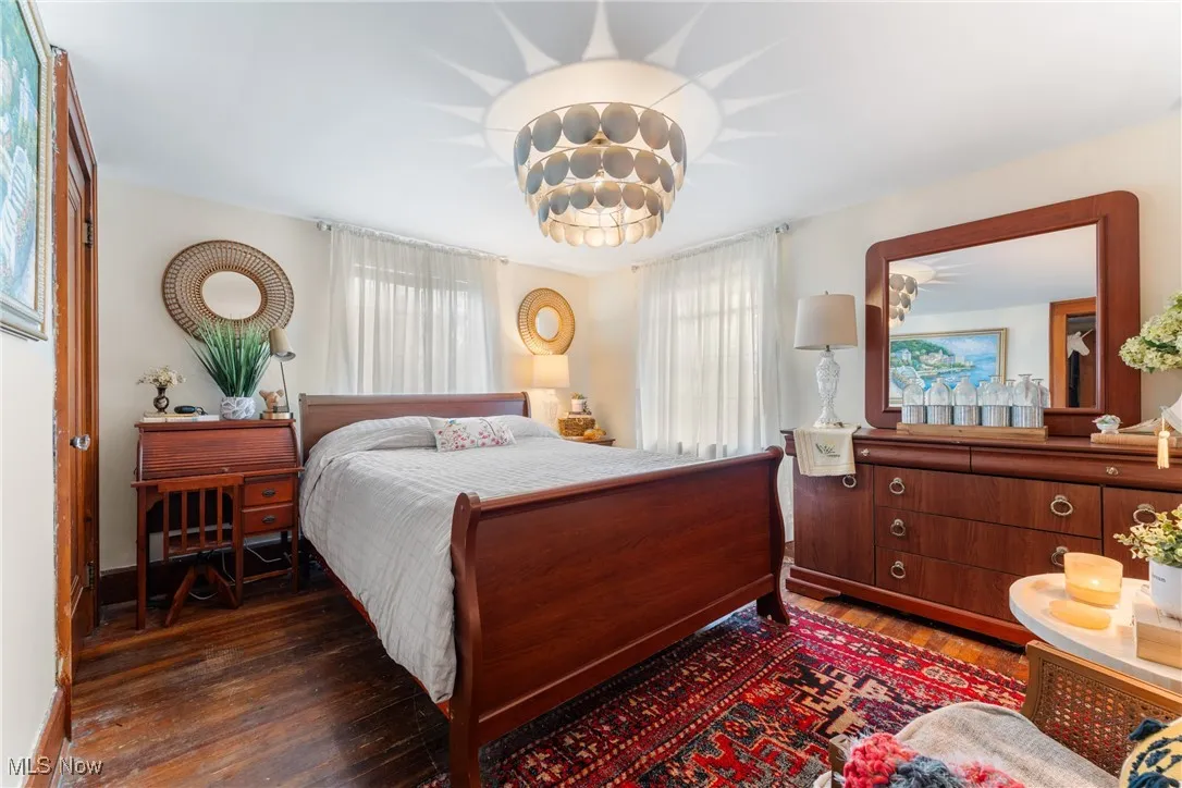 Bedroom with wood finished floors