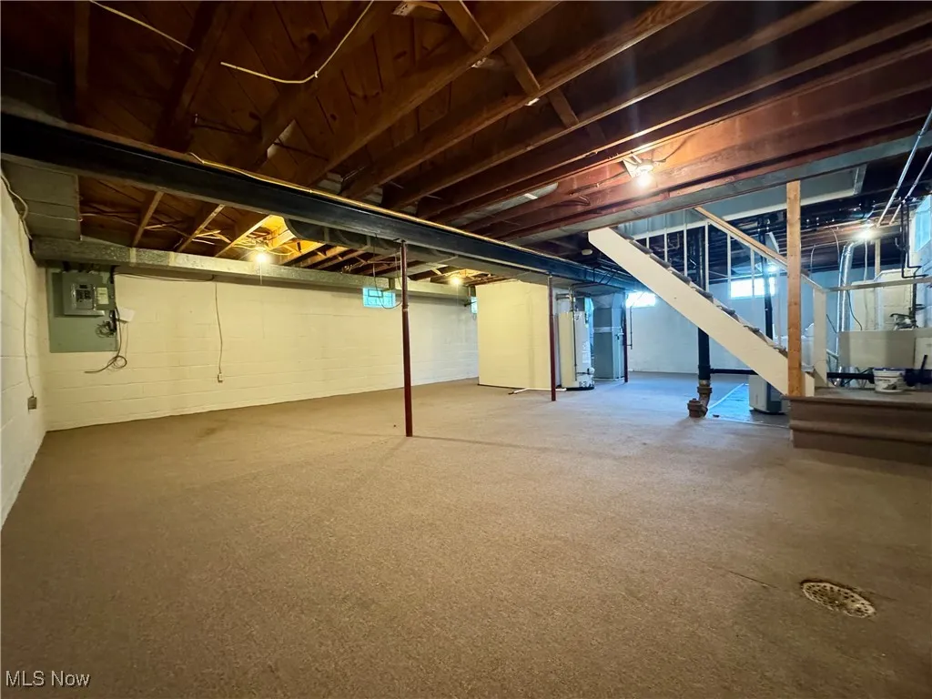 Unfinished below grade area with stairs