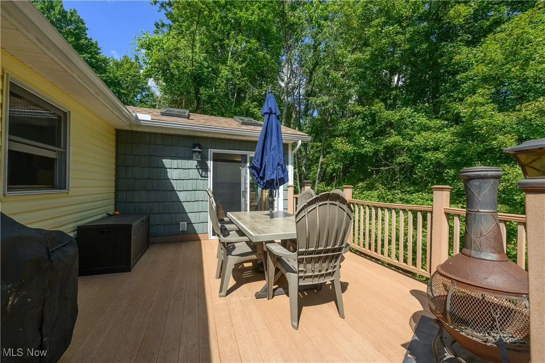 Wooden deck with outdoor dining space