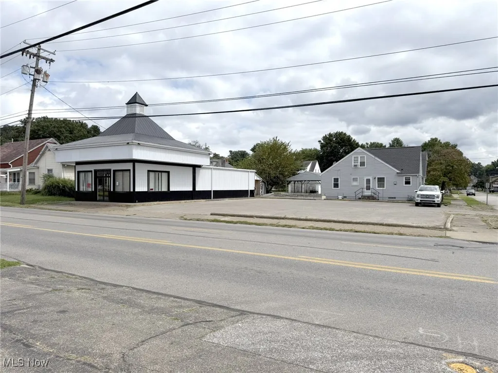 View of front of home featuring a metal roof