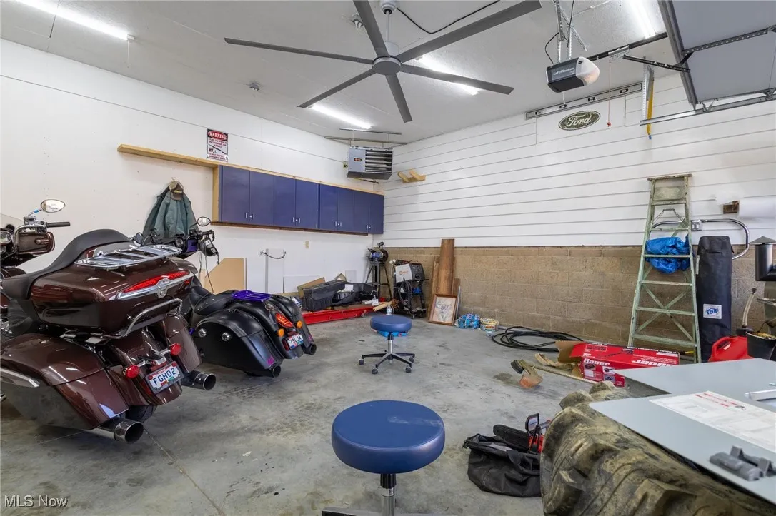 Garage with a heating unit and a garage door opener