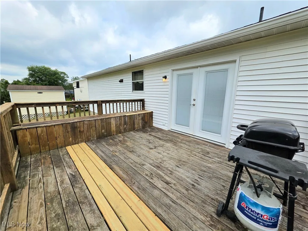 Wooden deck with area for grilling