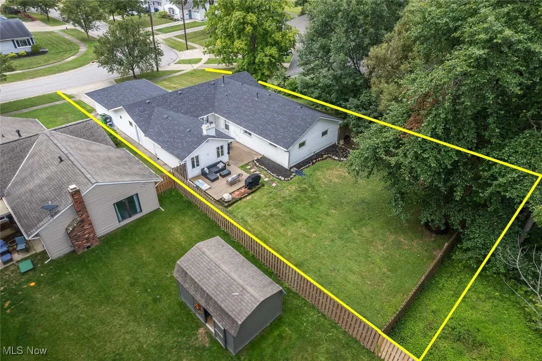 Aerial perspective of suburban area with property boundaries highlighted