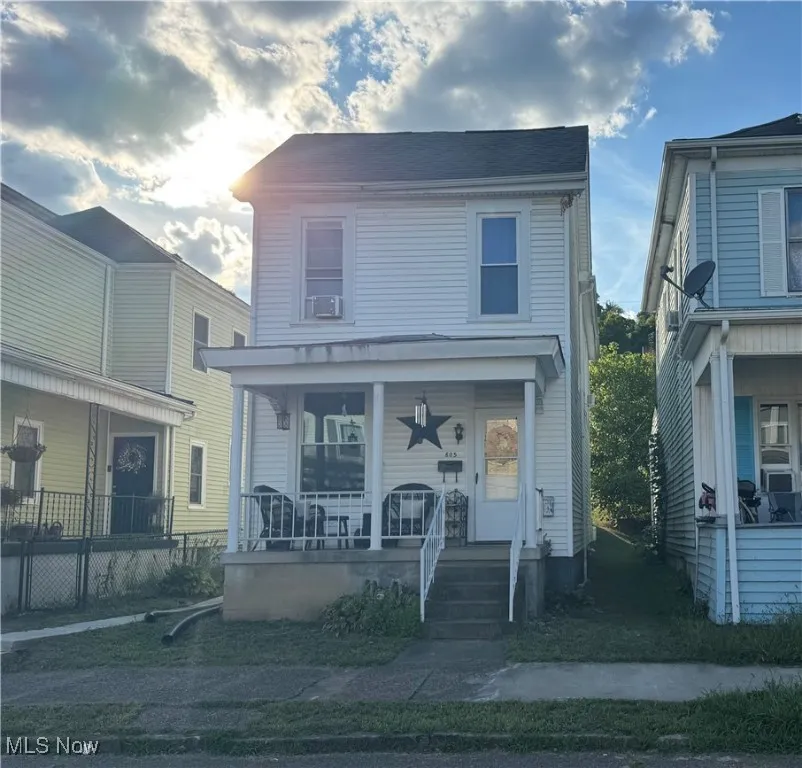 View of front of home featuring covered porch