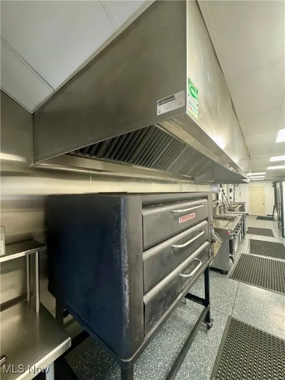 Detailed view of ventilation hood and speckle patterned floor