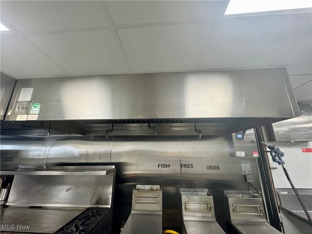 Detailed view of stainless steel refrigerator