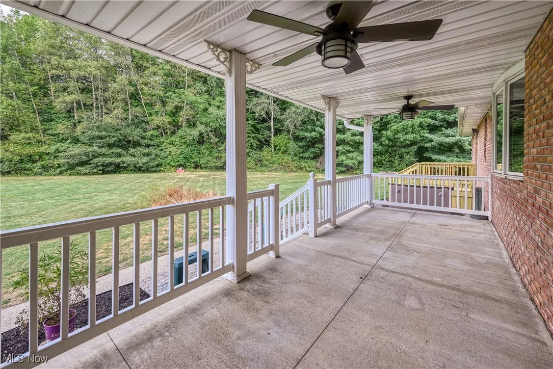 View of patio with a ceiling fan