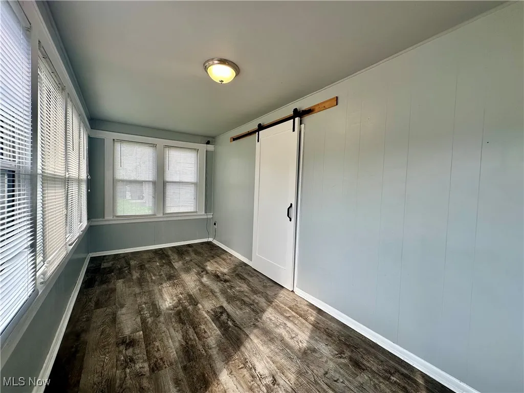 Upon entering the home, you are welcomed into this sunroom/mudroom - the perfect place to drop the backpacks and remove shoes. This would also make the perfect spot to enjoy a morning cup of coffee!