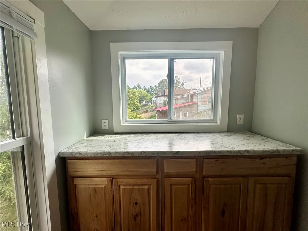 This new cabinet and countertop section provide additional storage and prep space.