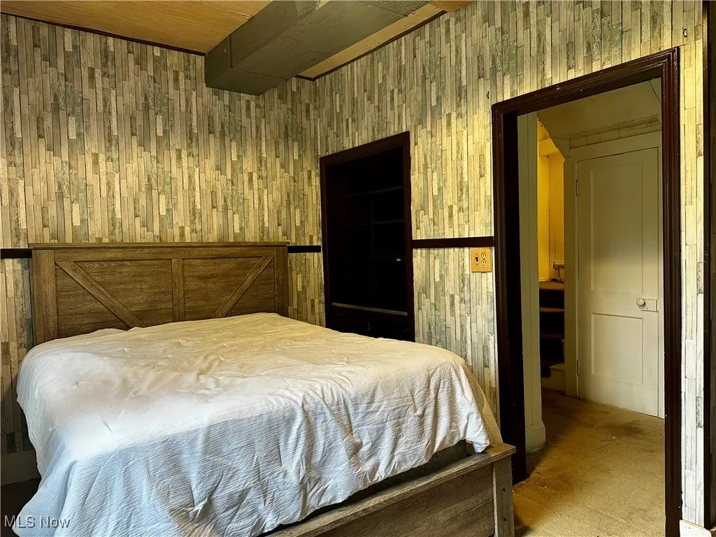 Second view of the downstairs primary bedroom.