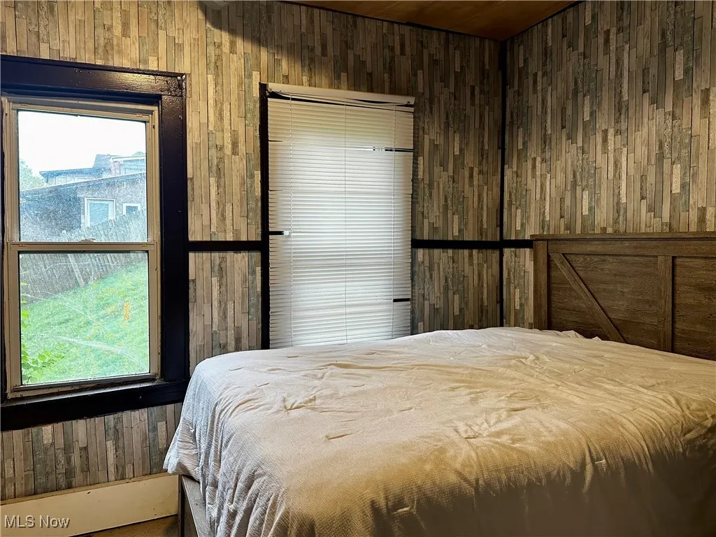 The primary bedroom is in the lower level, convenient to the laundry room.