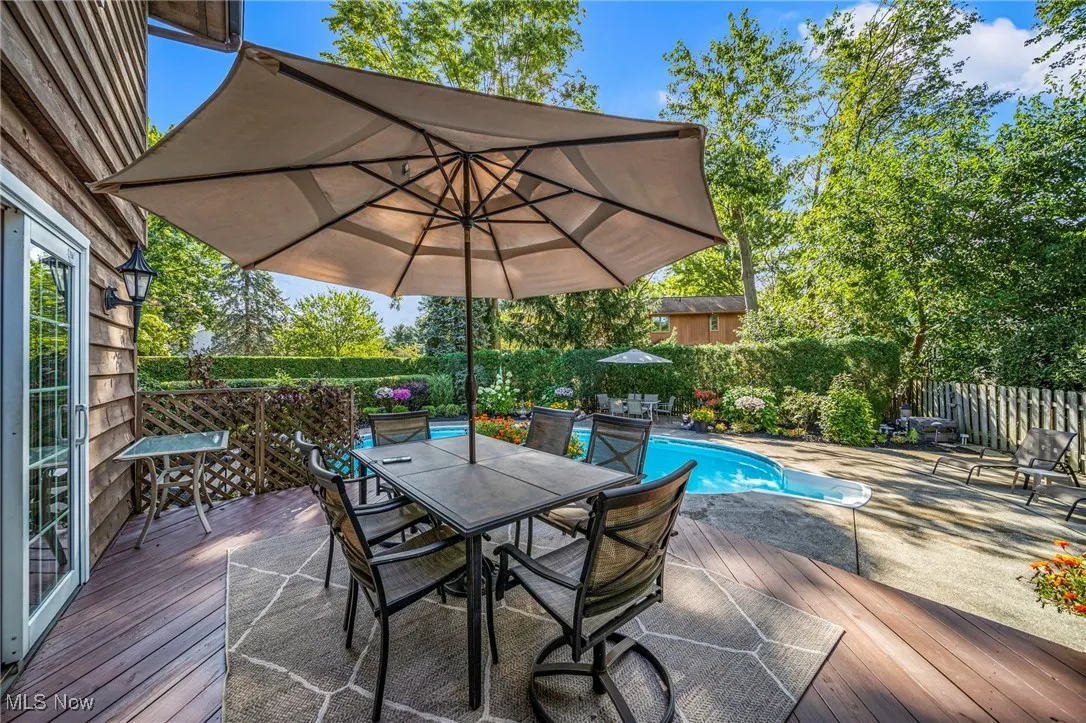 Wooden terrace with outdoor dining area