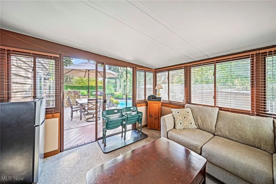 Living room with healthy amount of natural light and carpet flooring