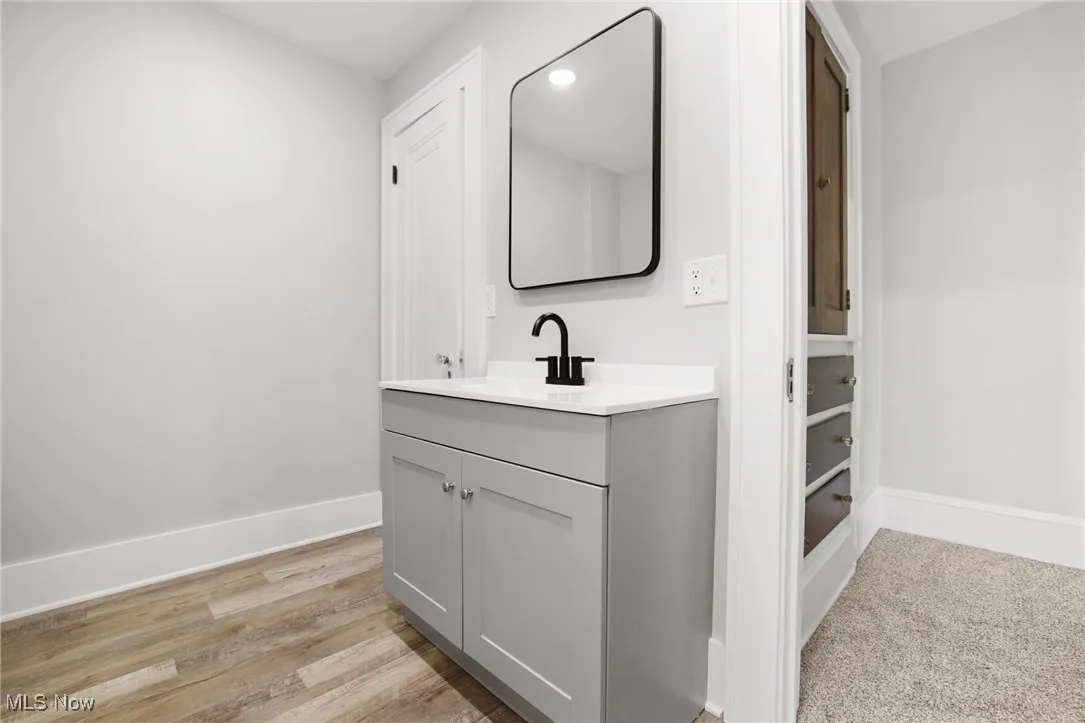 Bathroom with vanity, and LVT floors