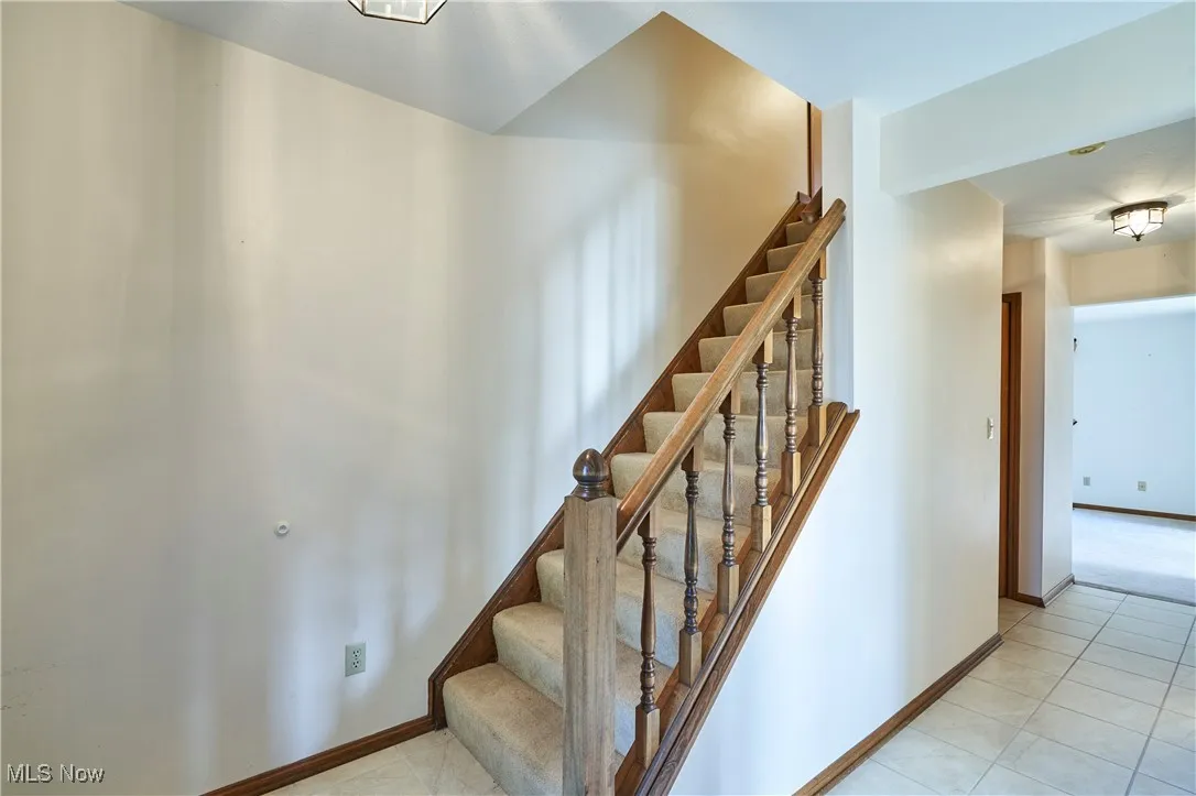 Foyer with tile flooring