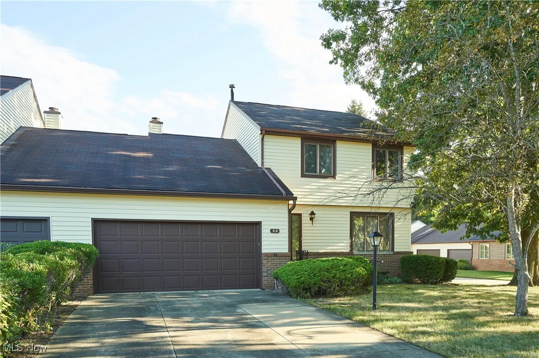 Welcome to  59 Tudor Lane . This is a 2 story condo with a basement. Call to see this 1900 sq ft plus condo with 2 bedrooms 2.5 baths and 2 car garage.