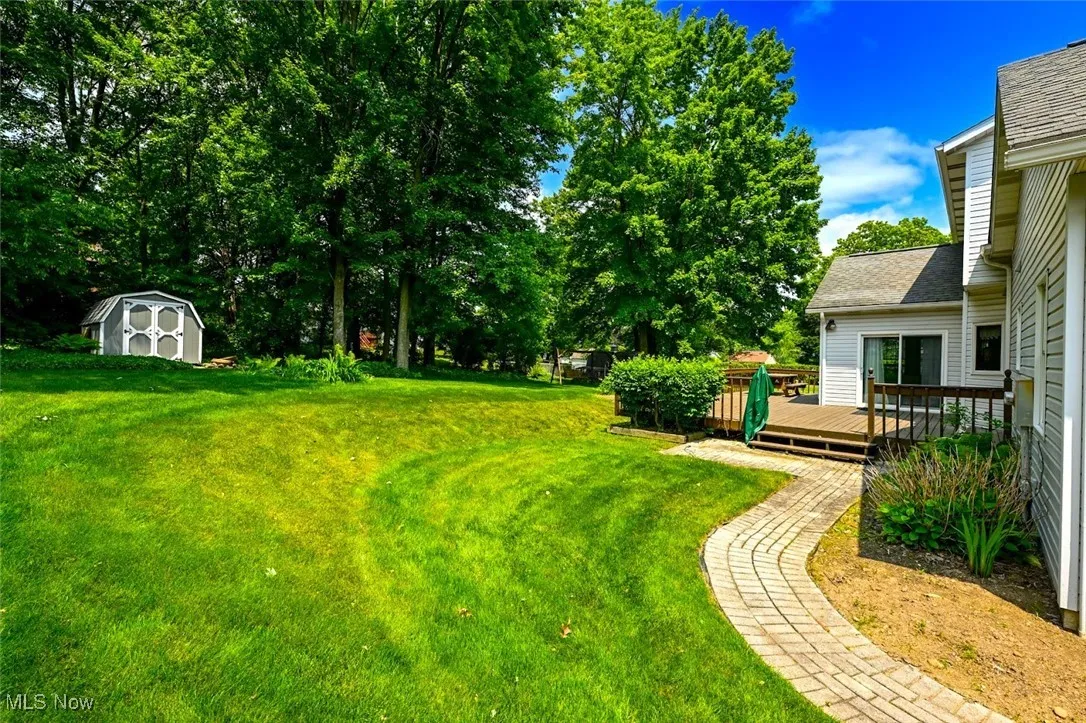 *SOME OF YARD AND LAND W/BRICK WALKWAY ~