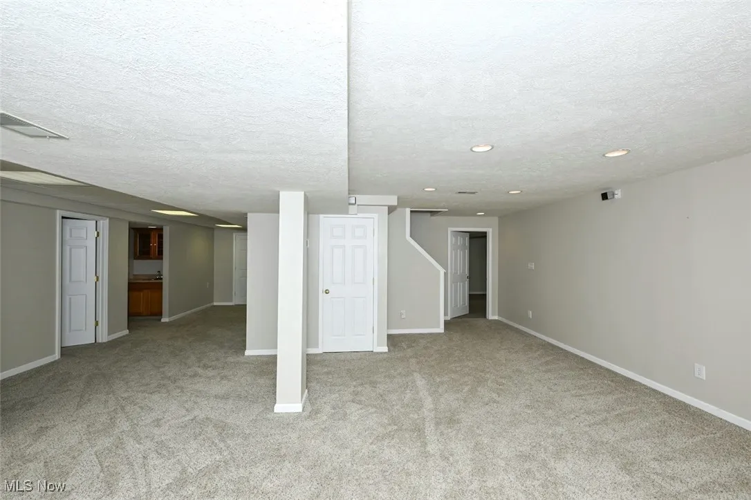 *FINISHED BASEMENT HAS 2 ENTRYS, ONE FROM HOME AND OTHER FROM GARAGE. RECREATION ROOM W/MULTIPLE WIDE CLOSETS FOR TONS OF STORAGE! ~