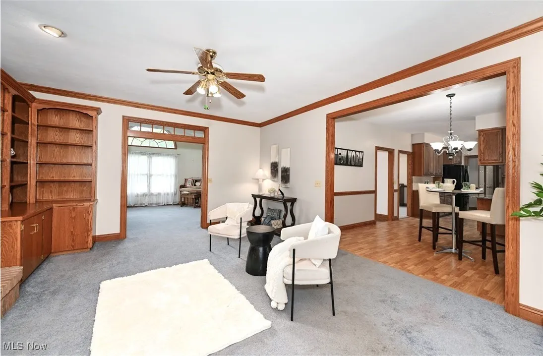 *COZY FAMILY ROOM W/FIREPLACE, BUILT IN SHELVING AND CABINETS, CEILING FAN NEAR LIVING RM AND EAT IN KITCHEN W/9 FT CEILING ~
