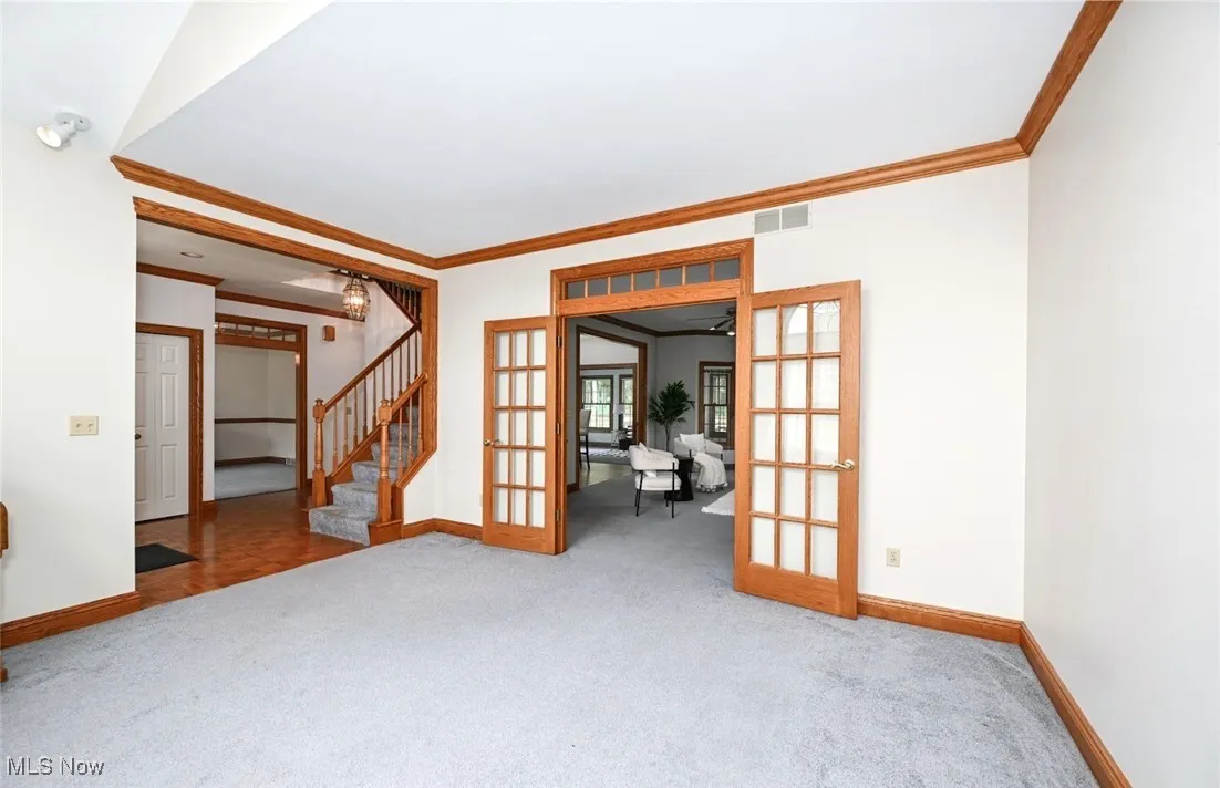 *LIVING RM W/VAULTED CEILING AND ARCHED BEAUTIFUL WINDOW, FRENCH DOOR ENTRY TO FAMILY RM ~