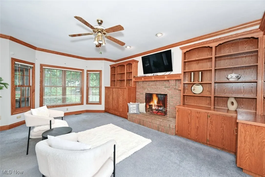 *COZY FAMILY ROOM W/FIREPLACE, BUILT IN SHELVING AND CABINETS, CEILING FAN NEAR LIVING RM AND EAT IN KITCHEN W/9 FT CEILING, CROWN MOLDING  ~