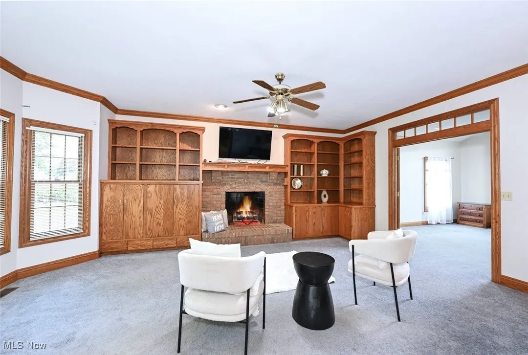 *COZY FAMILY ROOM W/FIREPLACE, BUILT IN SHELVING AND CABINETS, CEILING FAN NEAR LIVING RM AND EAT IN KITCHEN W/9 FT CEILING ~