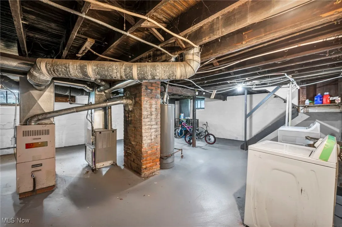 Below grade area with water heater and heating unit