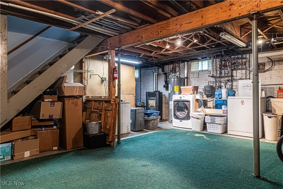 Basement with stairs and electric water​​‌​​​​‌​​‌‌​‌‌​​​‌‌​‌​‌​‌​​​‌​​ heater