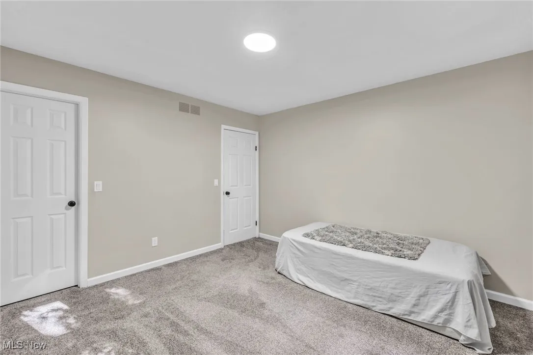Bedroom with carpet floors