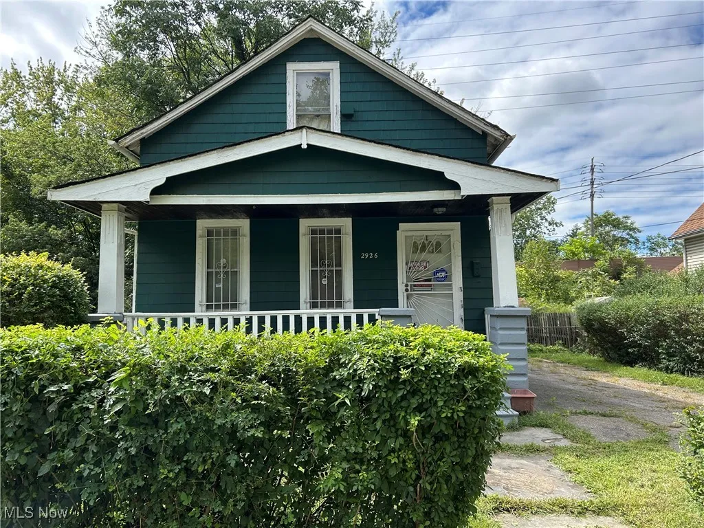 View of front of property with covered porch