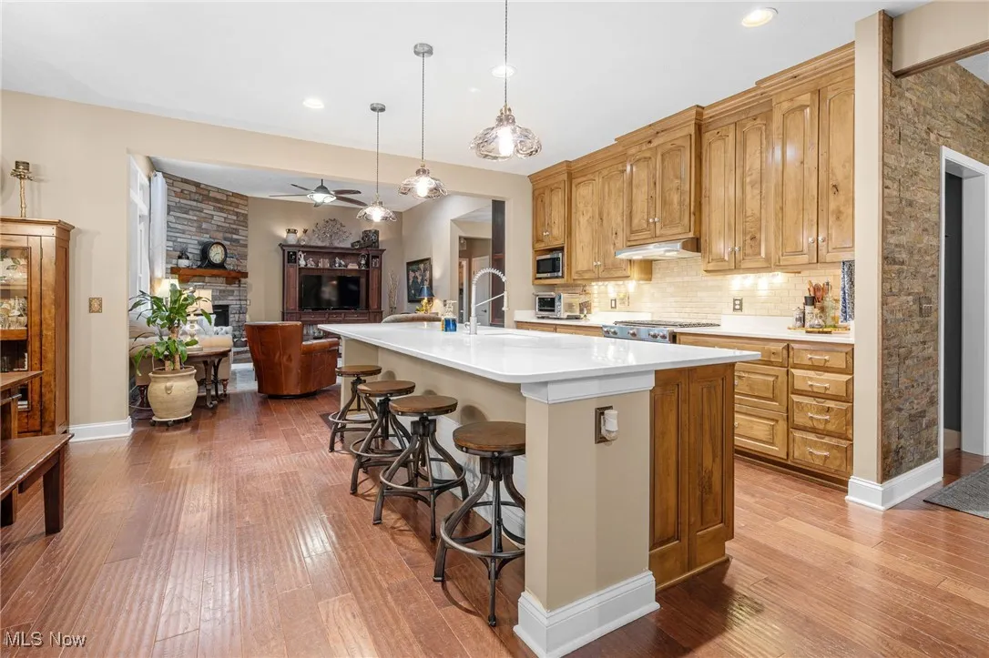 All cabinets are custom made of hickory including the large granite island.