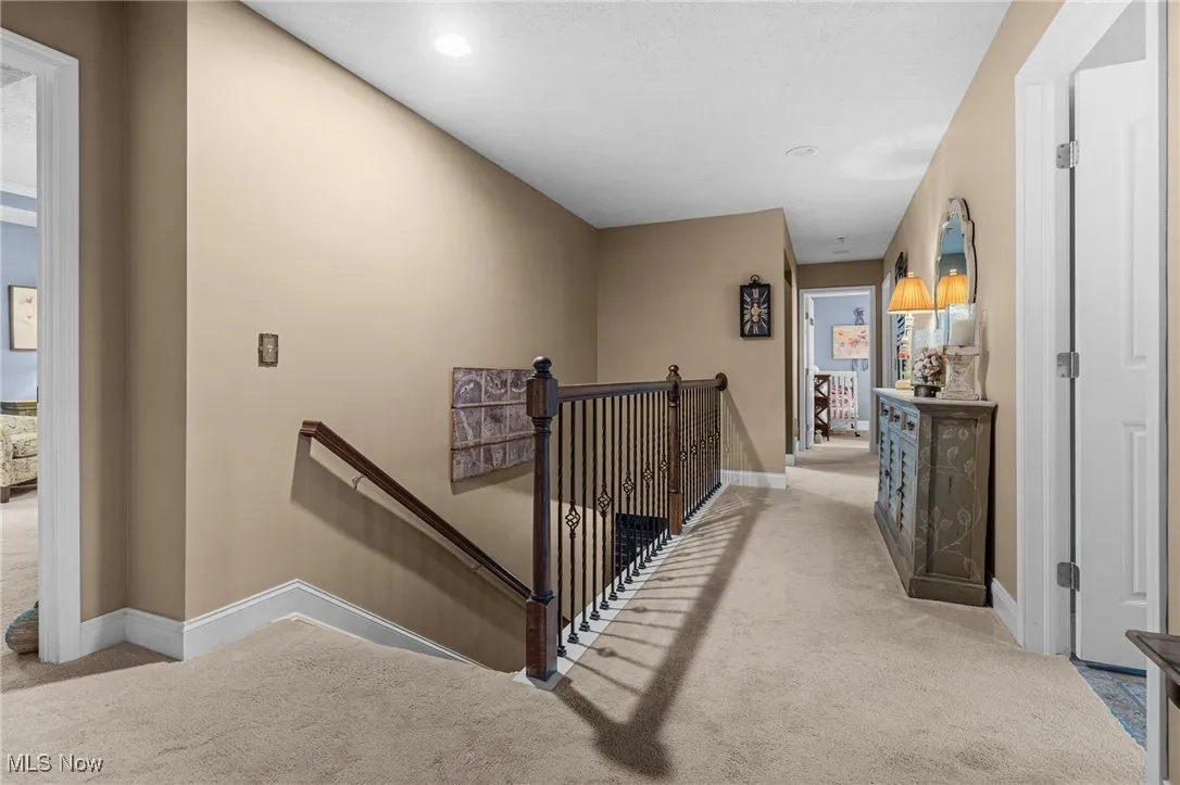 Second floor 4 bedrooms including owners suite and bath, another bedroom with it's own private full bath, new carpet.