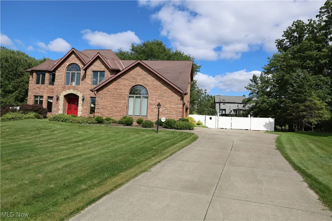 View of front of house with brick siding