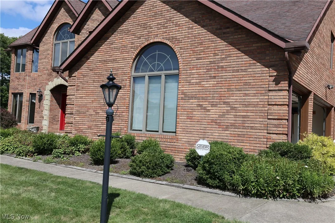 View of front of property with walkway