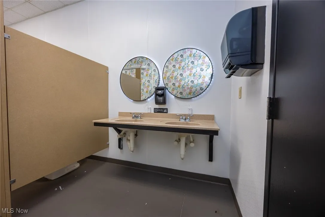 Bathroom featuring dual sinks