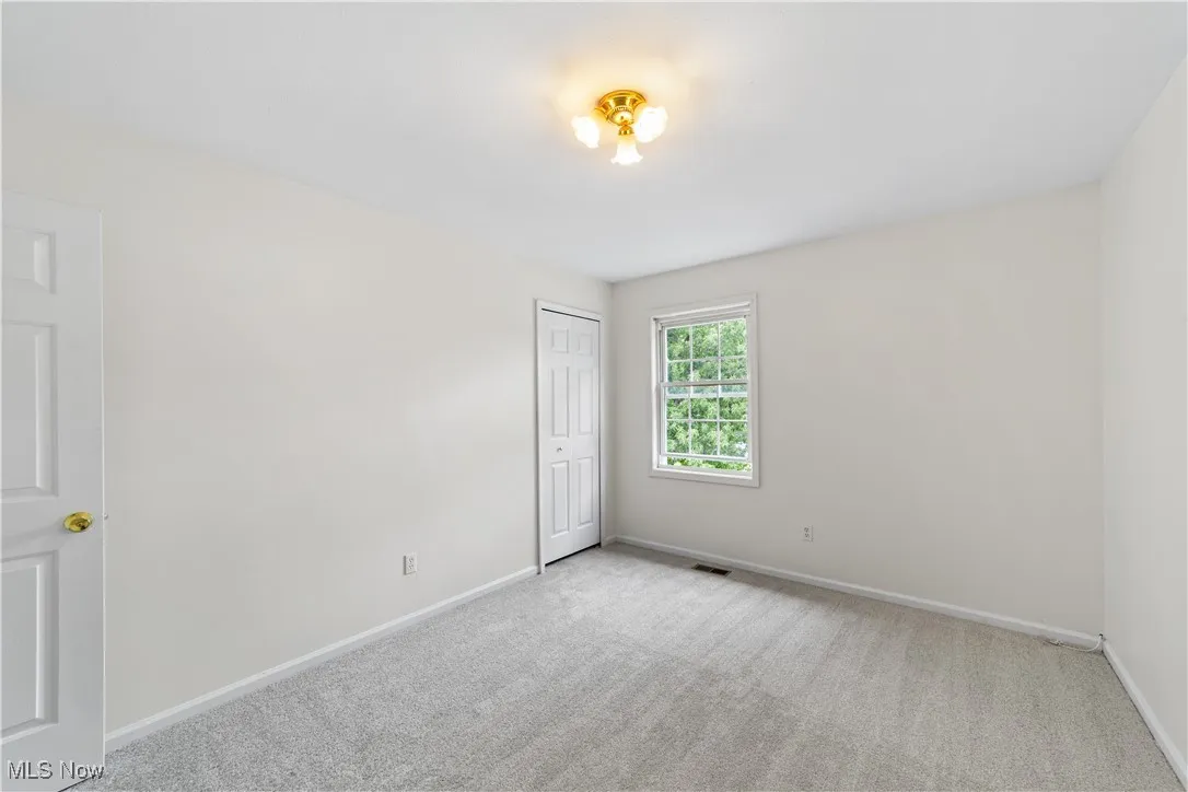 Bedroom with new carpet and freshly painted