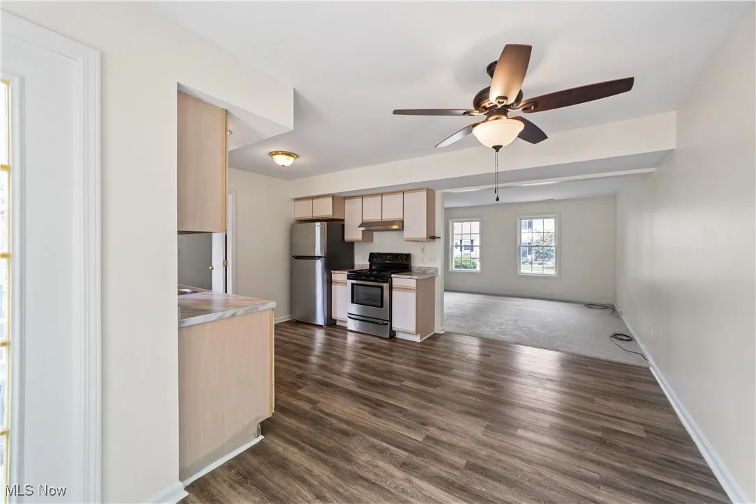 Kitchen with Vinyl Floor and Open to the Dining Room