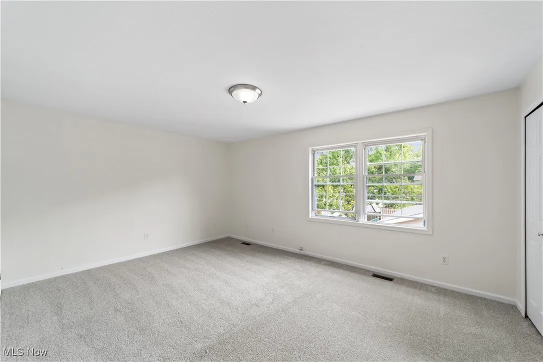 Bedroom with new carpet and freshly painted