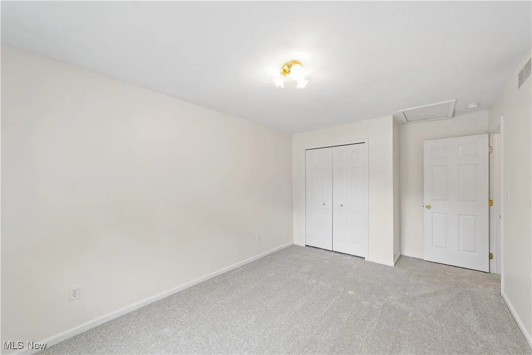 Bedroom with new carpet and freshly painted