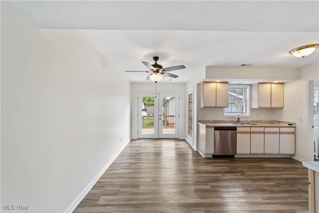 Kitchen with Vinyl Floor and Open to the Dining Room