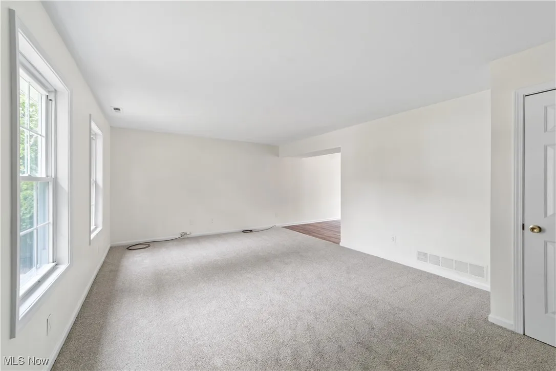 Living Room with new carpet and freshly painted interior