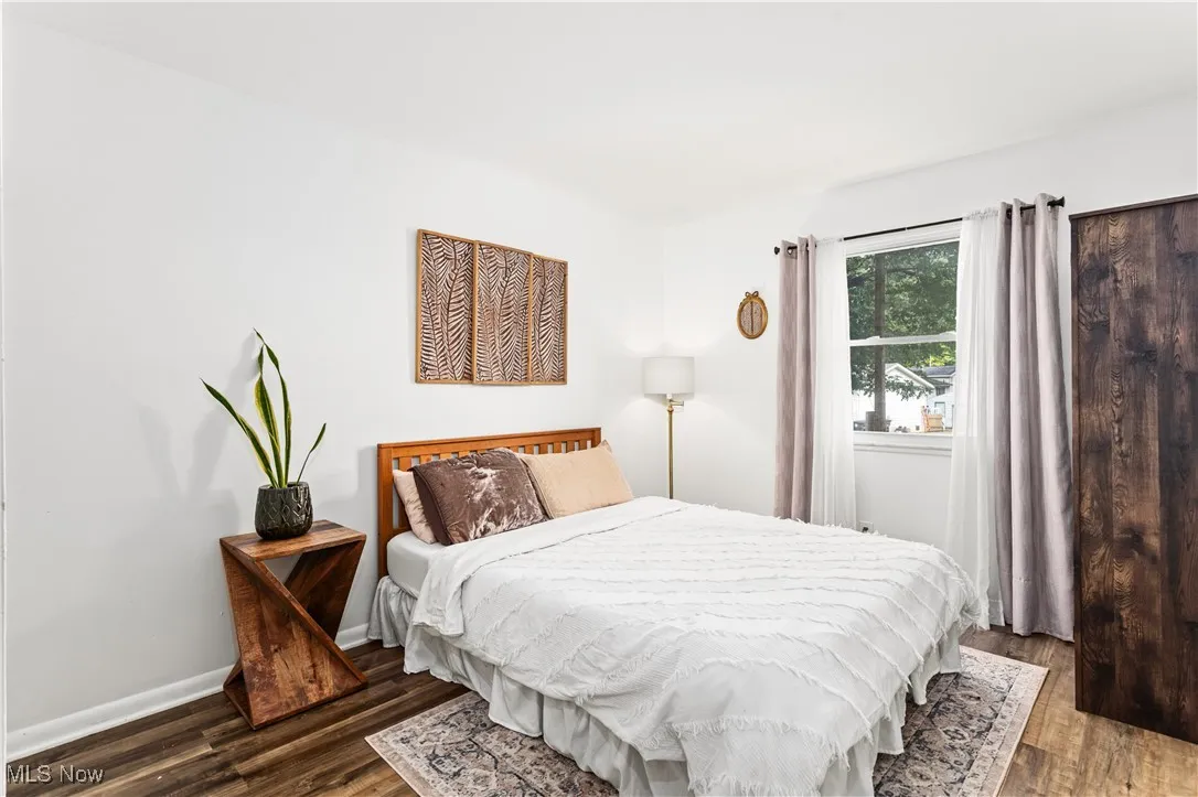 Bedroom featuring wood finished floors