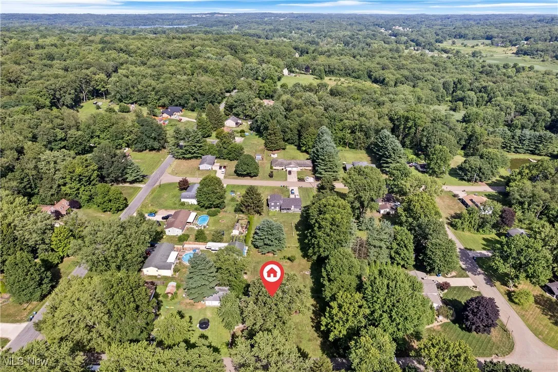 Drone / aerial view of a heavily wooded area