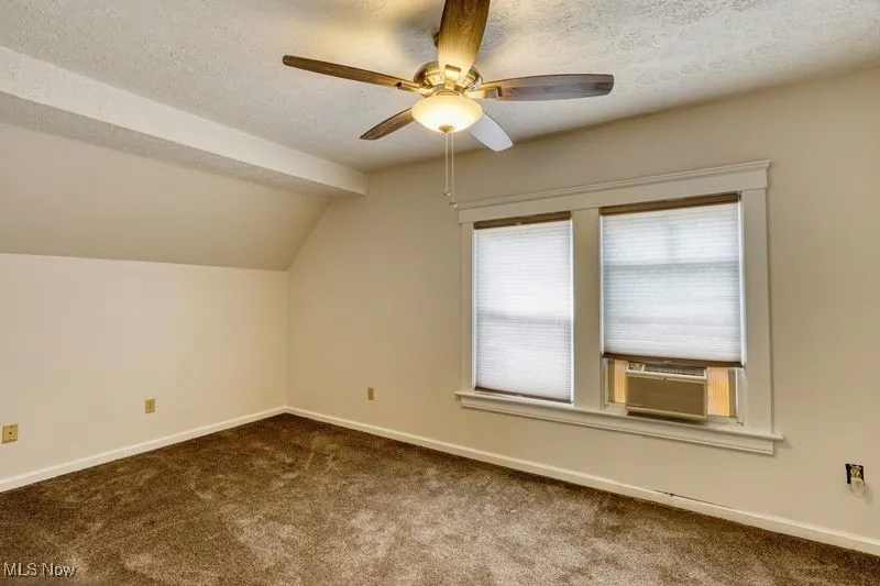 Owners bedroom with ceiling fan.