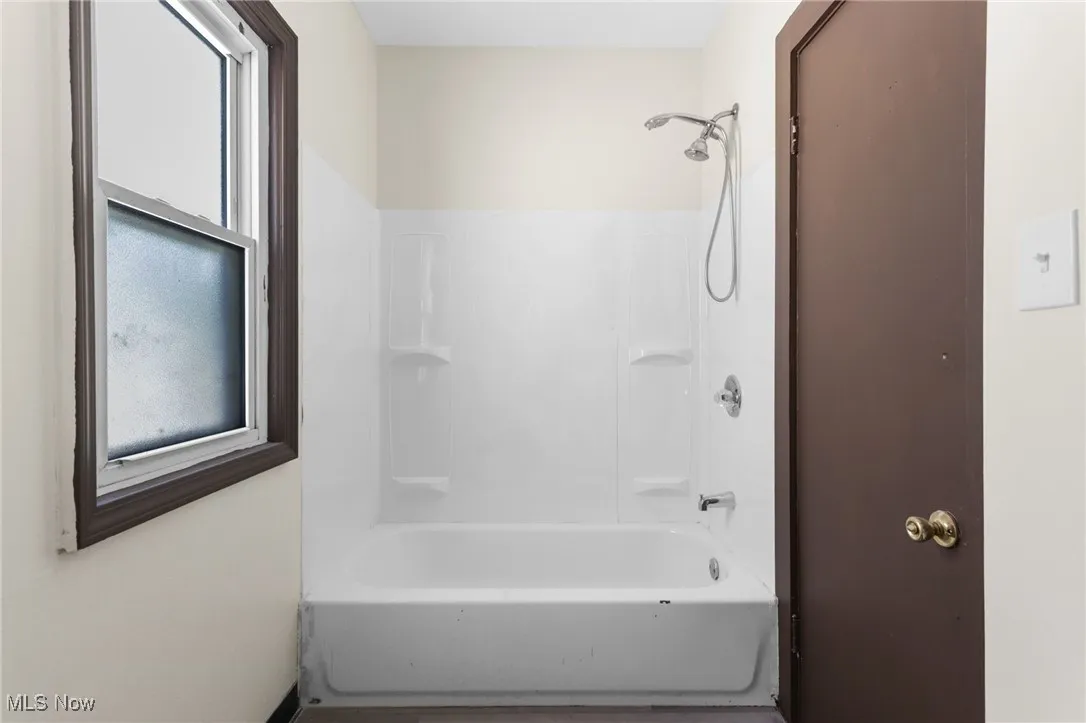 Bathroom featuring tub / shower combination